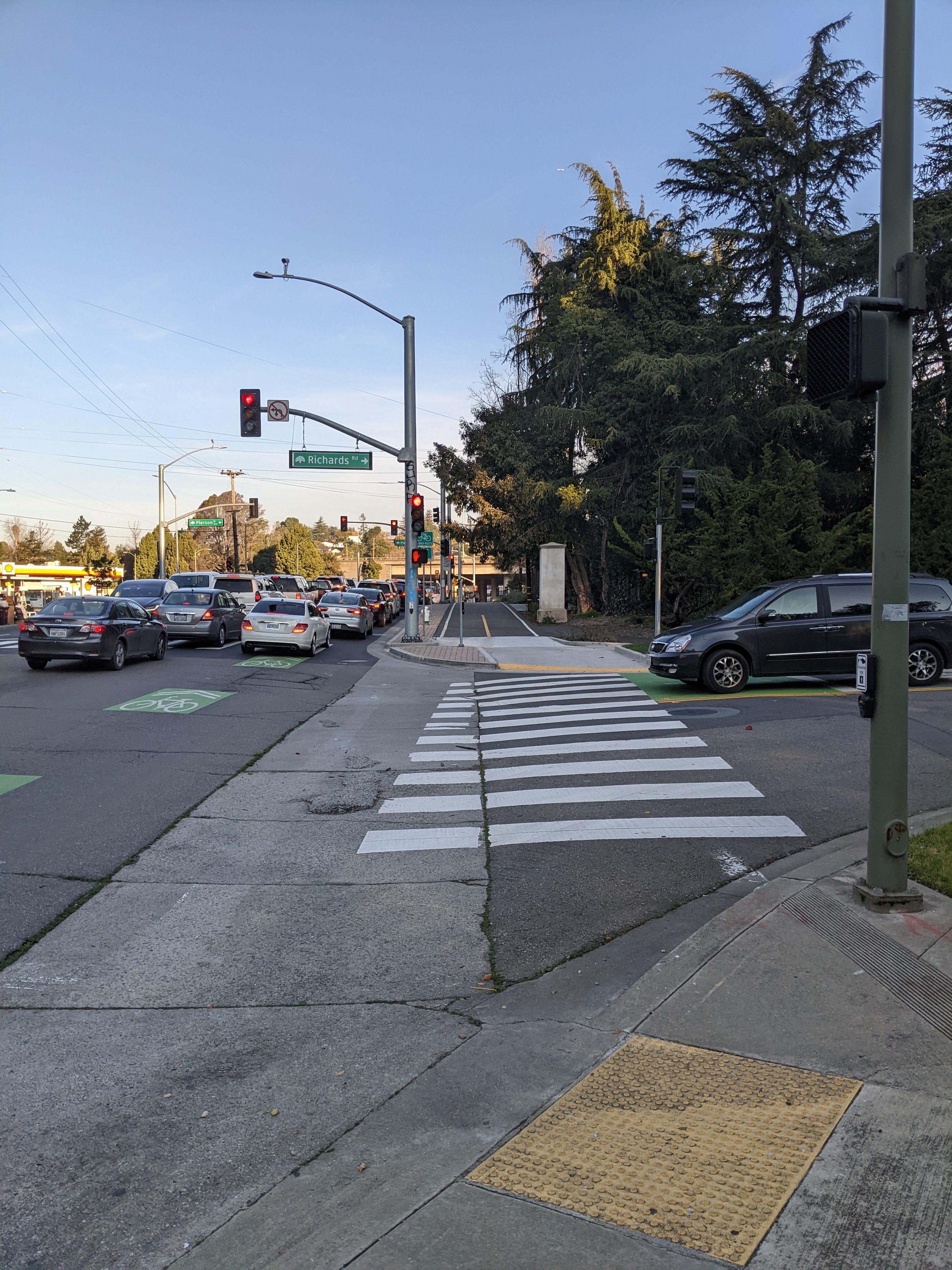 Existing marked crosswalk at an intersection on Macarthur Blvd